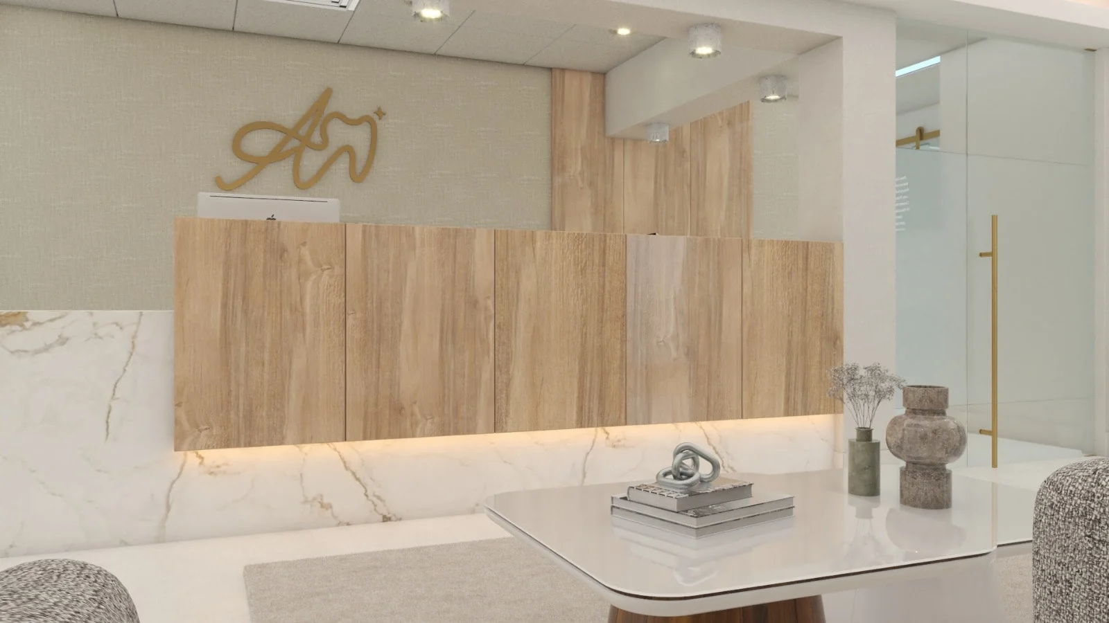 Allshine Dental Care — Close-up of the wood reception desk under the gold monogram, with a coffee table in the foreground