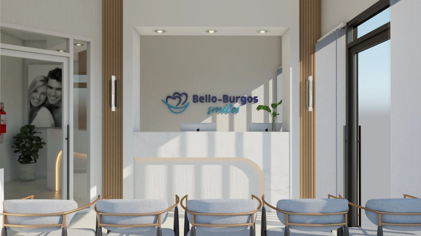 Bello-Burgos Smiles — Waiting area with gray upholstered chairs on brass-toned frames facing the reception and logo wall