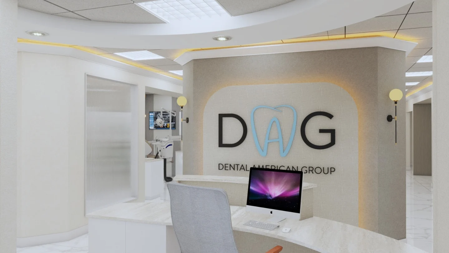 Dental American Group — Reception with a curved stone-look counter in front of the backlit “DAG” logo wall