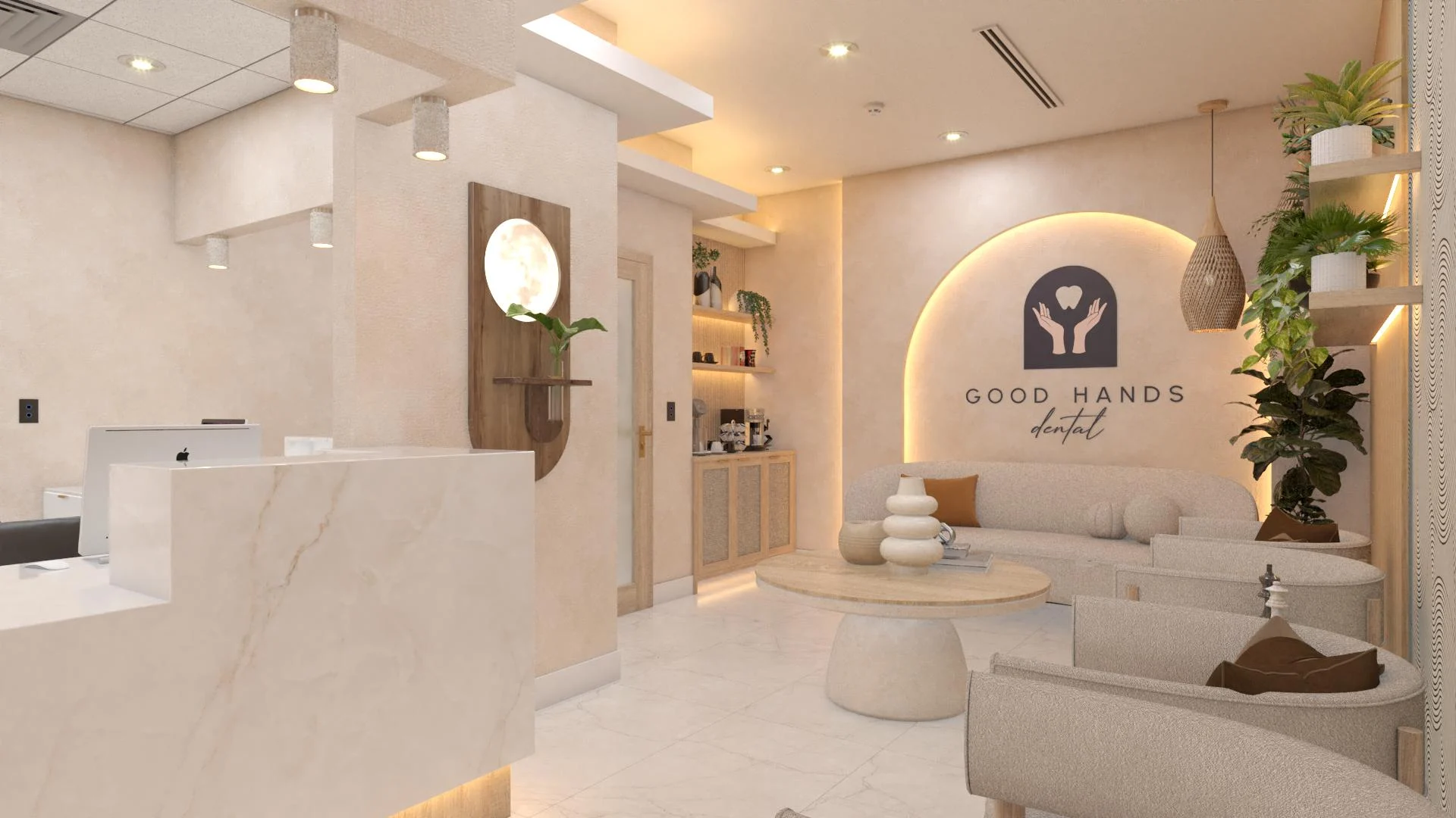 Good Hands Dental — Reception with a marble-look desk and a round moon-like lamp on wood, the logo wall beyond