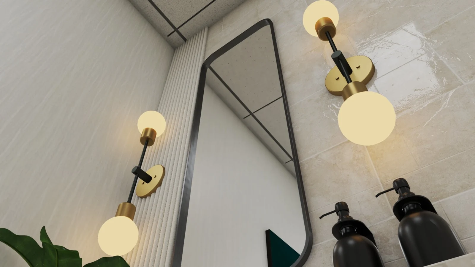 Habana Dental Care — Low-angle view of a bathroom mirror flanked by brass-toned and black globe sconces on beige tile