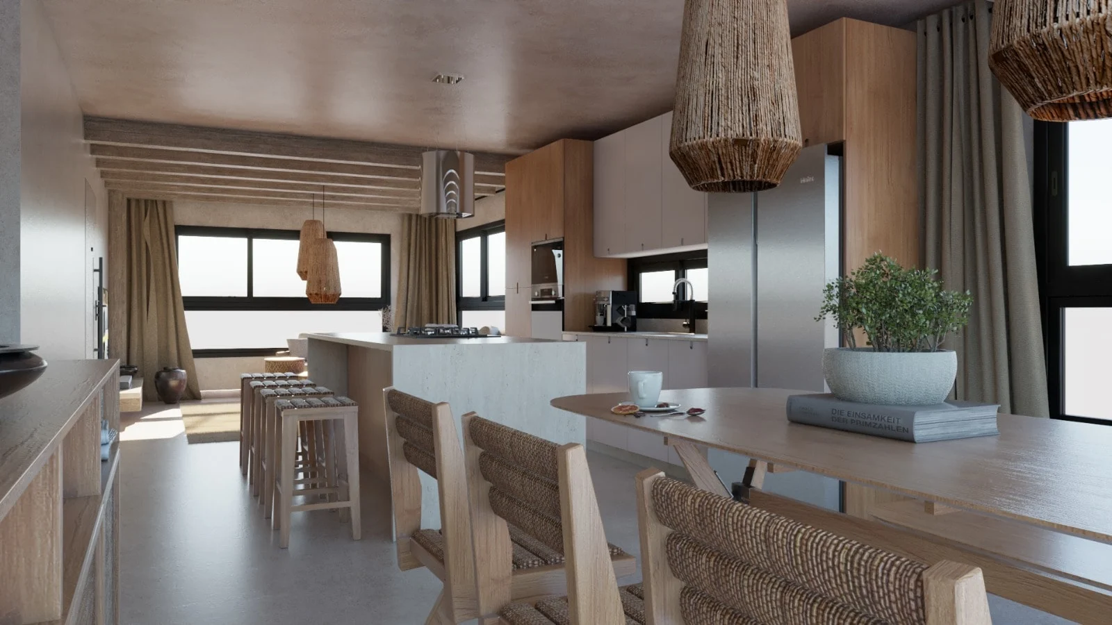 Villa Colibrí — View from the dining table past the kitchen island and woven stools toward the living room