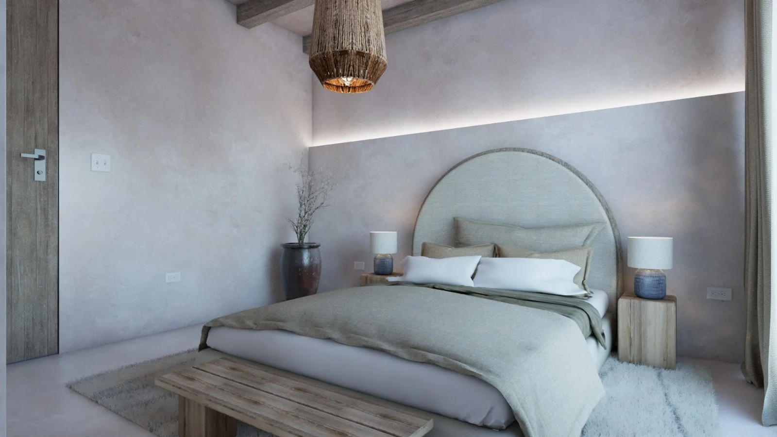 Villa Colibrí — Bedroom with an arched upholstered headboard, blue ceramic bedside lamps and a rope pendant